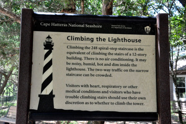 climbing the lighthouse sign